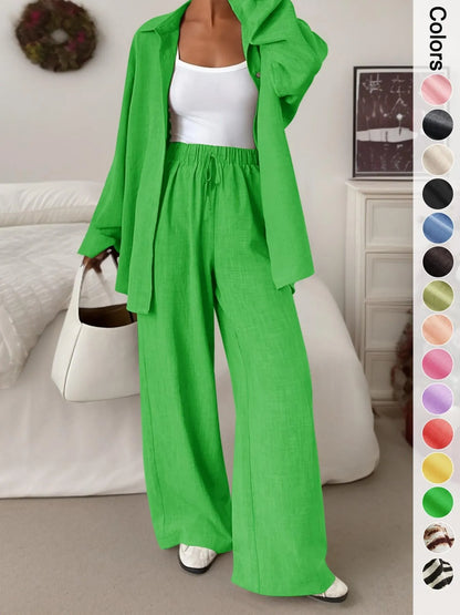 Women's casual athletic-style shirt and pants set—a two-piece ensemble featuring a loose-fitting button-down shirt and wide-leg pants, both comfortable and stylish