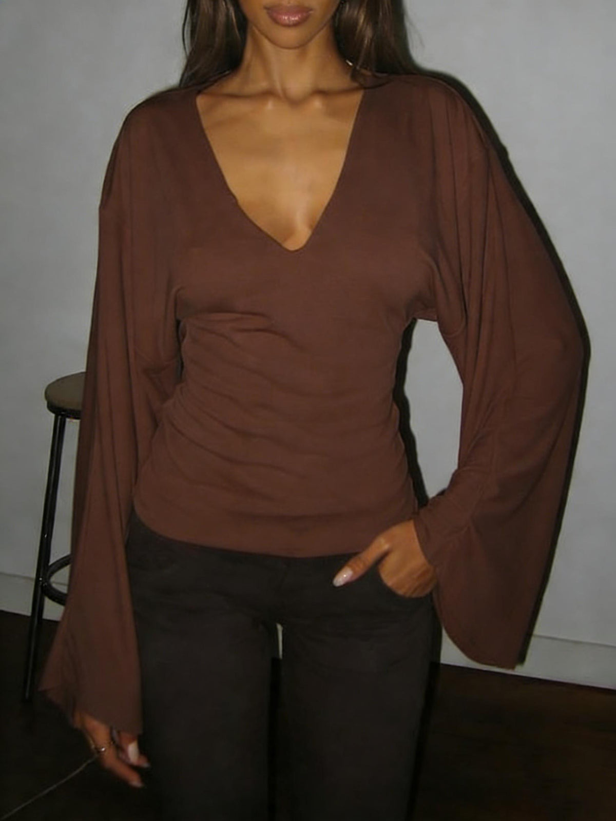 Elegant women's solid-color long-sleeved T-shirt, featuring a sexy deep V-neck and a slim-fit design
