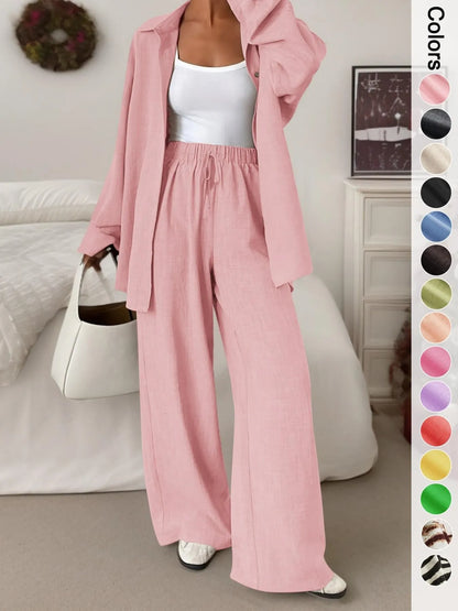 Women's casual athletic-style shirt and pants set—a two-piece ensemble featuring a loose-fitting button-down shirt and wide-leg pants, both comfortable and stylish