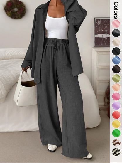Women's casual athletic-style shirt and pants set—a two-piece ensemble featuring a loose-fitting button-down shirt and wide-leg pants, both comfortable and stylish