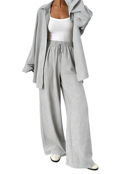 Women's casual athletic-style shirt and pants set—a two-piece ensemble featuring a loose-fitting button-down shirt and wide-leg pants, both comfortable and stylish