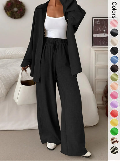 Women's casual athletic-style shirt and pants set—a two-piece ensemble featuring a loose-fitting button-down shirt and wide-leg pants, both comfortable and stylish