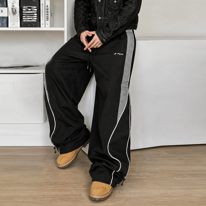 Men's high street style contrasting color splicing side striped tied wide-leg pants