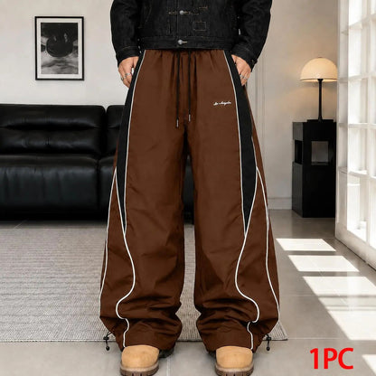 Men's high street style contrasting color splicing side striped tied wide-leg pants