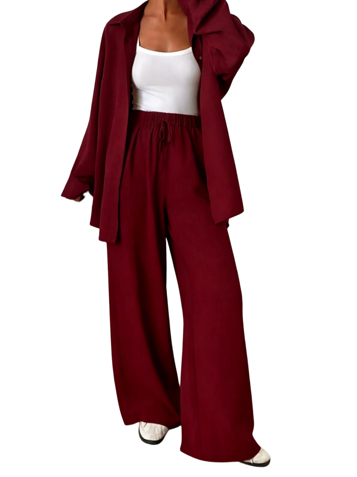 Women's casual athletic-style shirt and pants set—a two-piece ensemble featuring a loose-fitting button-down shirt and wide-leg pants, both comfortable and stylish
