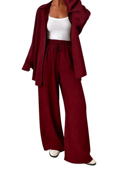 Women's casual athletic-style shirt and pants set—a two-piece ensemble featuring a loose-fitting button-down shirt and wide-leg pants, both comfortable and stylish
