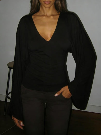 Elegant women's solid-color long-sleeved T-shirt, featuring a sexy deep V-neck and a slim-fit design