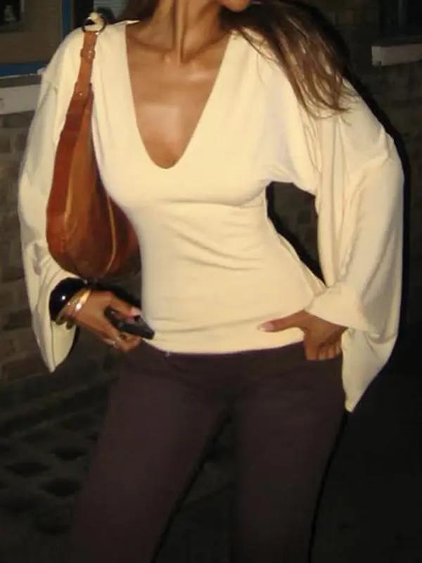 Elegant women's solid-color long-sleeved T-shirt, featuring a sexy deep V-neck and a slim-fit design