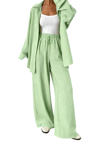 Women's casual athletic-style shirt and pants set—a two-piece ensemble featuring a loose-fitting button-down shirt and wide-leg pants, both comfortable and stylish